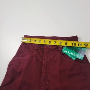 size 0 the measurements are in the photos. worn one time.